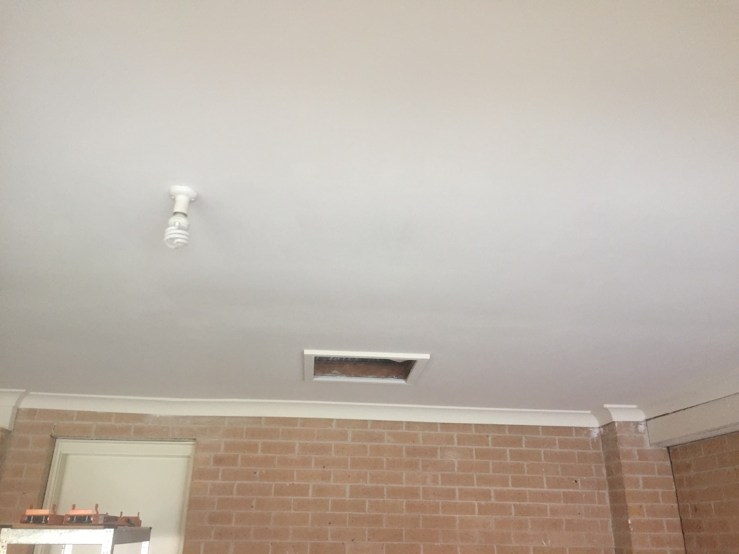 Painting the finished ceiling